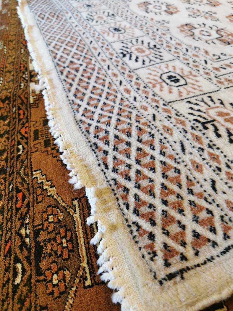 pakistani bukhara rug fringe repairs before