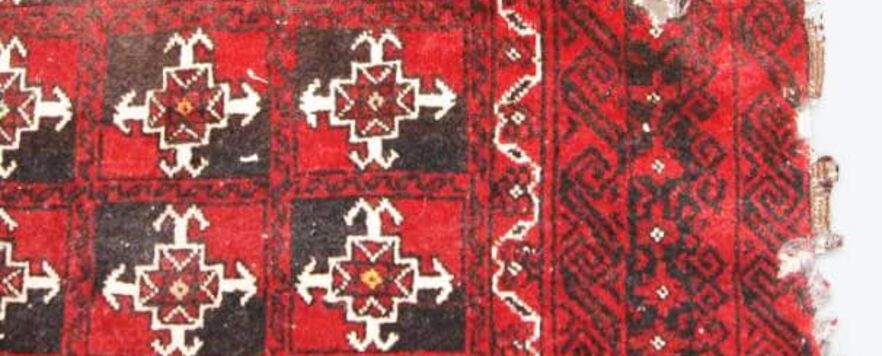 Baluch rug repair before Baluch rug repair
