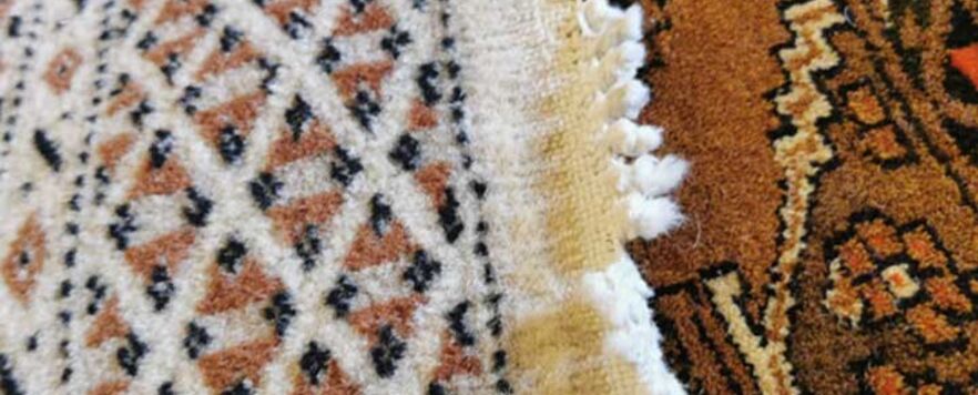 Pakistani Bokhara Hand Knotted Rug Fringe repairs -before Pakistani Bokhara Hand Knotted Rug Fringe repairs -before